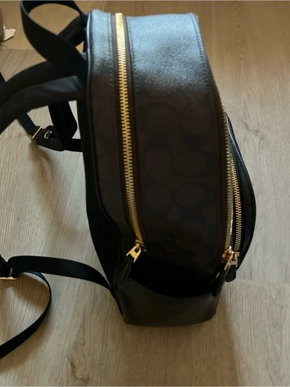 Medium Coach Black Pebbled Leather Mini Backpack with Gold Logo